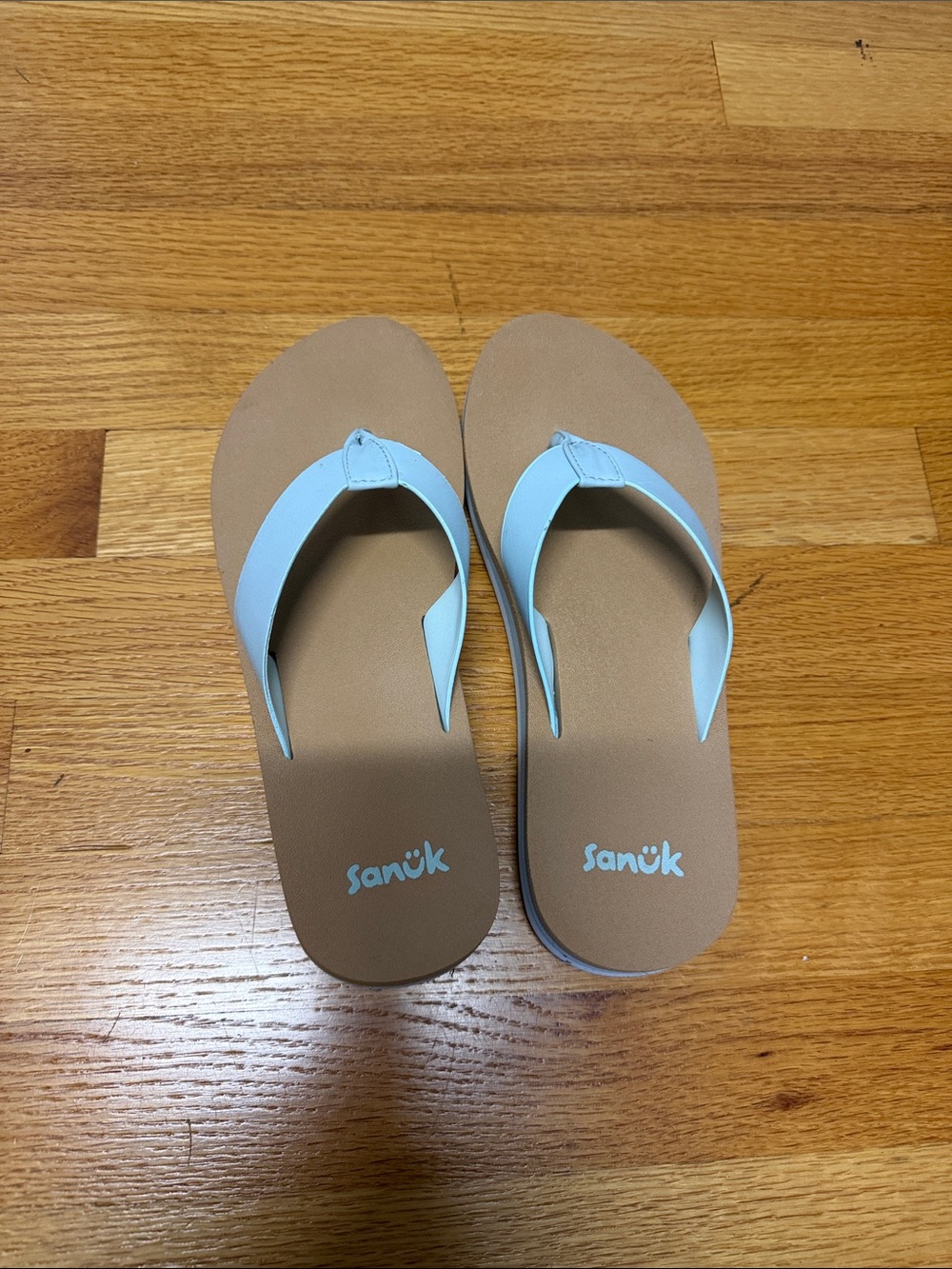 Sanuk Women’s Tan Footbed Flip Flops with Light Blue Straps